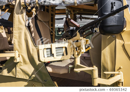 heavy machine gun mounted on a car for shooting 69365342