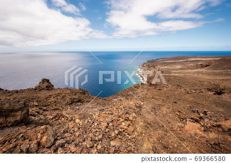 Scenic volcanic coastline landscape in el Hierro, Canary Islands, Spain. Scenic volcanic coastline landscape in el Hierro, Canary Islands, Spain. 69366580
