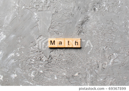 math word written on wood block. math text on table, concept 69367899