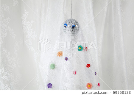 ghost in lace curtain with flowers ghost in lace curtain with flowers 69368128