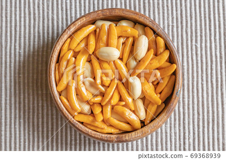 Persimmon seeds and peanuts, right above angle 69368939