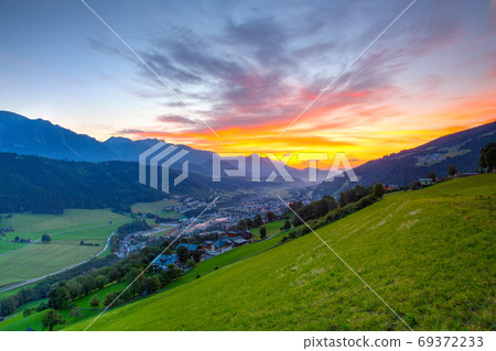 Dachstein mountain and Schladming city at sunrise. 69372233