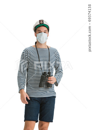 Caucasian male sailor in uniform isolated on white studio background Caucasian male sailor in uniform isolated on white studio background 69374138