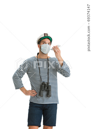 Caucasian male sailor in uniform isolated on white studio background Caucasian male sailor in uniform isolated on white studio background 69374147