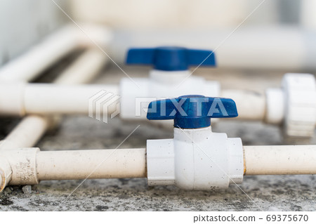 White water pipes with blue faucet, stock photo White water pipes with blue faucet, stock photo 69375670