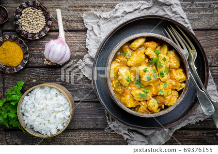 chicken cooked with curry sauce chicken cooked with curry sauce 69376155
