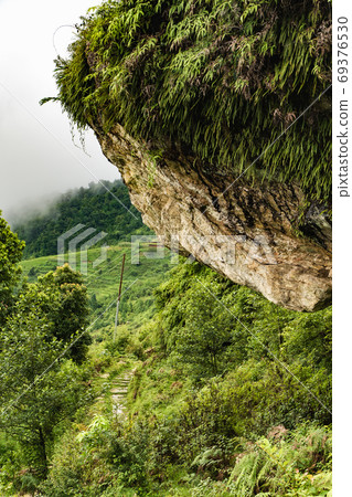 Picture of Himalayas mountains covered with fog Picture of Himalayas mountains covered with fog 69376530