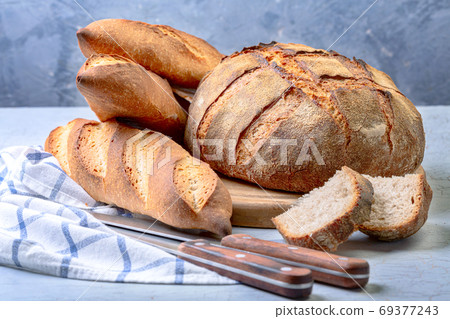Artisan bread and sourdough baguettes. 69377243