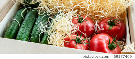 Wooden and cardboard crate box with fresh ripe 69377409
