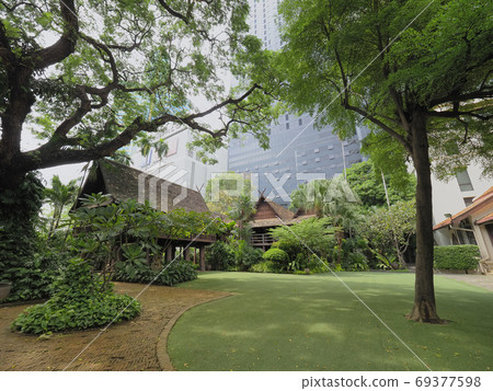 Bangkok, Thailand Urban oasis green space / garden surrounded by trees Bangkok, Thailand Urban oasis green space / garden surrounded by trees 69377598