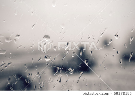 Rain drops on the glass 69378195