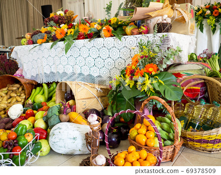 Many Vegetables, fruits and flowers are Decorated for Happy Thanksgiving Day Many Vegetables, fruits and flowers are Decorated for Happy Thanksgiving Day 69378509