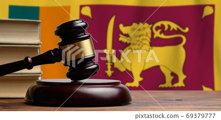 Justice and court concept in Democratic Socialist Republic of Sri Lanka. Judge hammer on a flag background 69379777