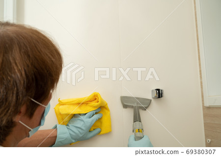 Cleaning The Bath Wall With A Steam Cleaner Stock Photo 69380307 Pixta - Can You Use A Steam Cleaner On Walls Cleaning The Bath Wall With A Steam Cleaner Stock Photo 69380307 Pixta - Can You Use A Steam Cleaner On Walls