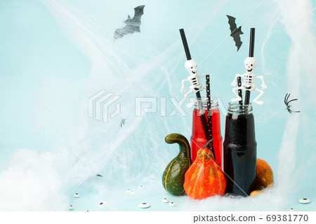 Halloweens spooky drink, black red green cocktail for party in g Halloweens spooky drink, black red green cocktail for party in g 69381770