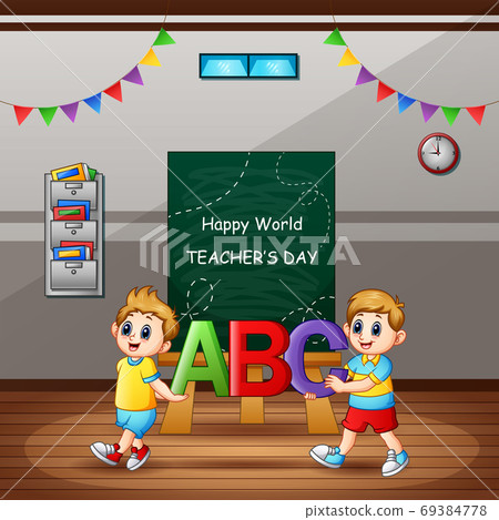 Happy Teachers Day with student holding ABC letter 69384778