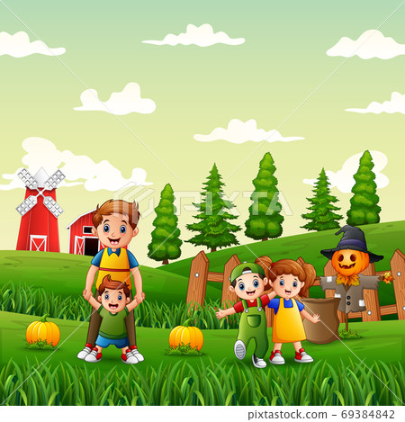 Happy family in the pumpkin garden 69384842