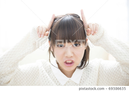 An angry woman An angry woman 69386635