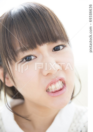 An angry woman An angry woman 69386636