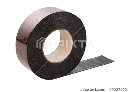 roll of narrow mounting tape made of rubber from resin, for tight connection of roof seams, on a white background roll of narrow mounting tape made of rubber from resin, for tight connection of roof seams, on a white background 69387030