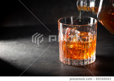 Glass of scotch whiskey Glass of scotch whiskey 69389083