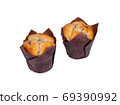 Two muffins in wax liner on white. 69390992