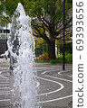 Fountain blowing up in the park 69393656