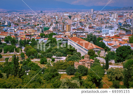 Aerial city view of Athens, capital of Greece. Ancient Agora. Stoa of Attalos, Odeon of Agrippa and Church of Holy Apostles or Solakis in foreground. 69395155