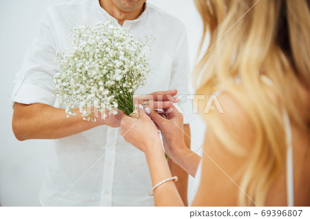 Hands of the bride and groom. Bride and groom holding hands at a wedding ceremony. Hands of the bride and groom. Bride and groom holding hands at a wedding ceremony. 69396807