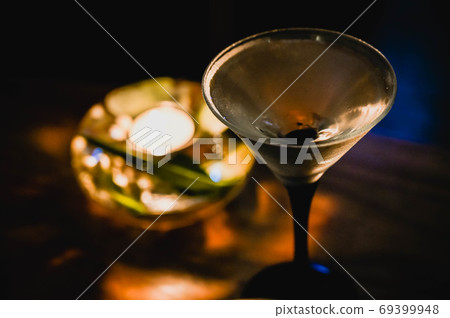 Cocktail at the bar in the dark Adult time with candlelight 69399948