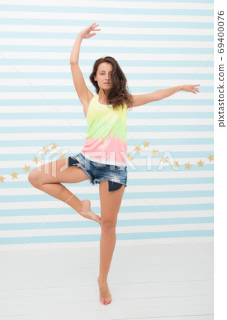 Woman fit slim lady posing as ballerina. Healthy lifestyle keep Woman fit slim lady posing as ballerina. Healthy lifestyle keep 69400076