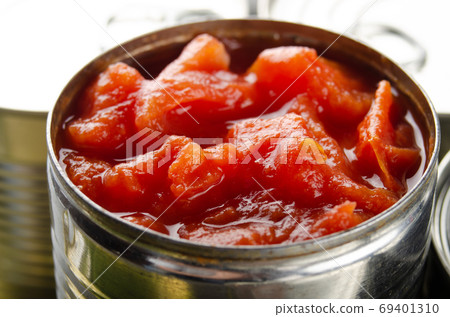 Canned sliced tomatoes in just opened tin can. Non-perishable fo 69401310