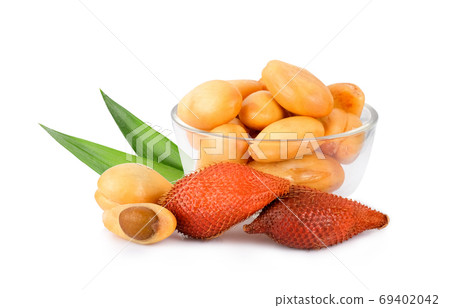 salak fruit in the glass bowl with green leaf isolated on white salak fruit in the glass bowl with green leaf isolated on white 69402042