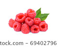pile of fresh raspberry with leaf isolated on white background 69402796