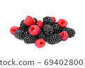 raspberries and blackberries isolated on white background 69402800