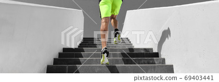 Stairs workout runner man running up climbing stair outdoor gym cardio hiit interval run training panoramic banner background 69403441