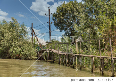 Traditional old wooden rural sidewalk in Vilkove, Ukraine. 69405197