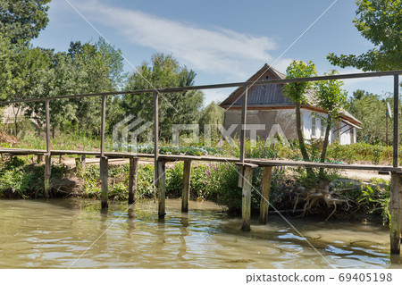 Traditional old wooden rural sidewalk in Vilkove, Ukraine. 69405198