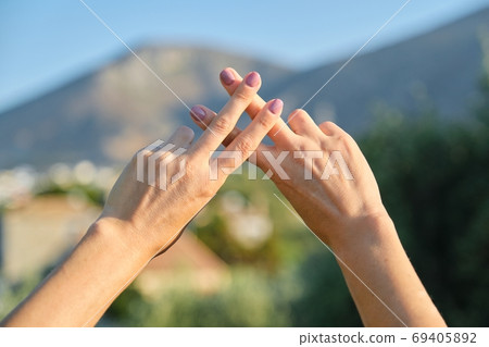 Hashtag abstract symbol shown by fingers, technology and nature concept 69405892