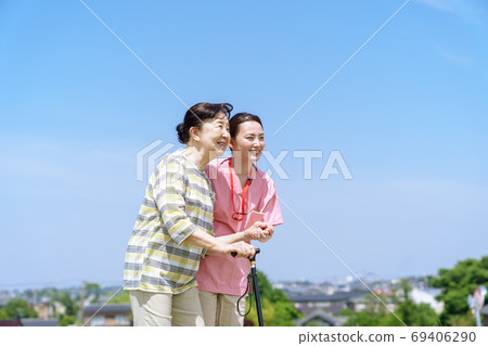 Senior women, long-term care, canes, blue sky 69406290