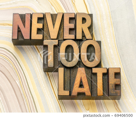 never too late word abstract in wood type 69406500