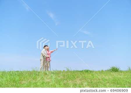 Senior women, long-term care, canes, blue sky 69406909