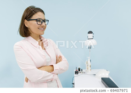 Portert of confident successful business woman, owner of beauty salon Portert of confident successful business woman, owner of beauty salon 69407971