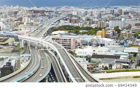 Fukuoka cityscape and highways taken from inside a passenger plane Fukuoka cityscape and highways taken from inside a passenger plane 69414349