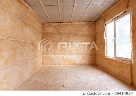 Roll insulation on the inner walls of a small room Roll insulation on the inner walls of a small room 69414984