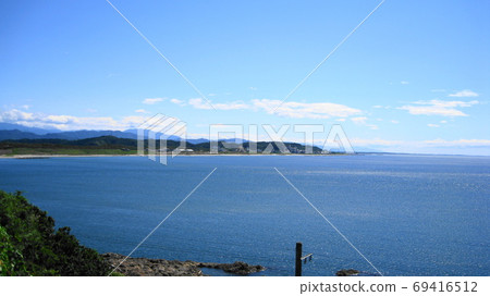 The blue Sea of Japan seen from Iwagasaki, Murakami City, and the Senami hot spring town along the coast 69416512