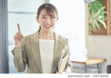 Business finger pointing woman Business finger pointing woman 69416949