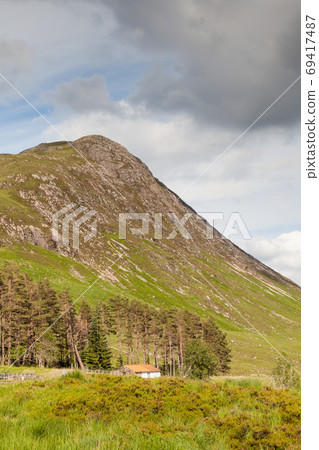 Glencoe Hillside. A view of a Glencoe hillside in the Scottish highlands. Glencoe is the most famous of all the Scottish glens. Glencoe Hillside. A view of a Glencoe hillside in the Scottish highlands. Glencoe is the most famous of all the Scottish glens. 69417487