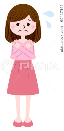 A woman who makes a cross gesture A woman who makes a cross gesture 69417543