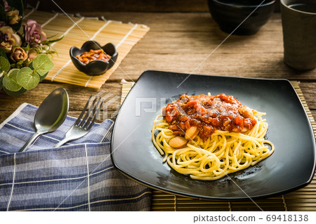 Spaghetti pasta with sausage and tomato sauce Spaghetti pasta with sausage and tomato sauce 69418138
